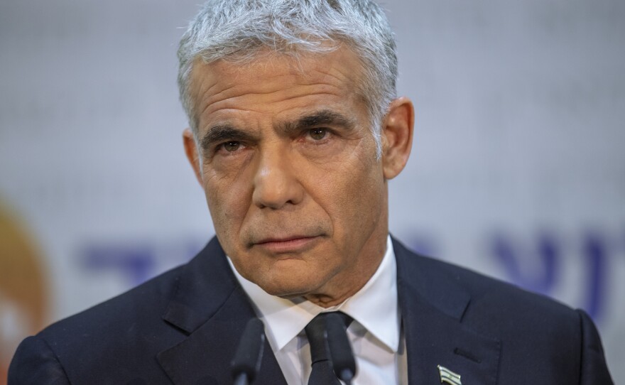 Israel's opposition leader Yair Lapid will serve the latter half of the four-year prime minister term. Although his party held more seats in the Knesset, he agreed to let Naftali Bennett serve the first two years.