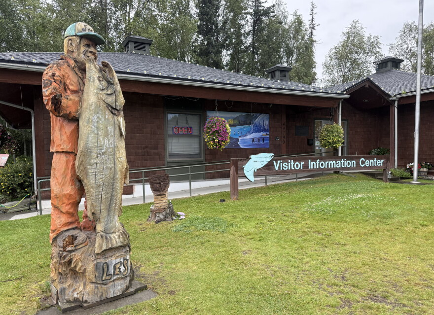 A wood satue of Les Anderson and his world-record-holding king salmon stands outside of the Soldotna Chamber of Commerce on Saturday, Aug. 22, 2026 in Soldotna, Alaska. Anderson caught the fish in the nearby Kenai River.
