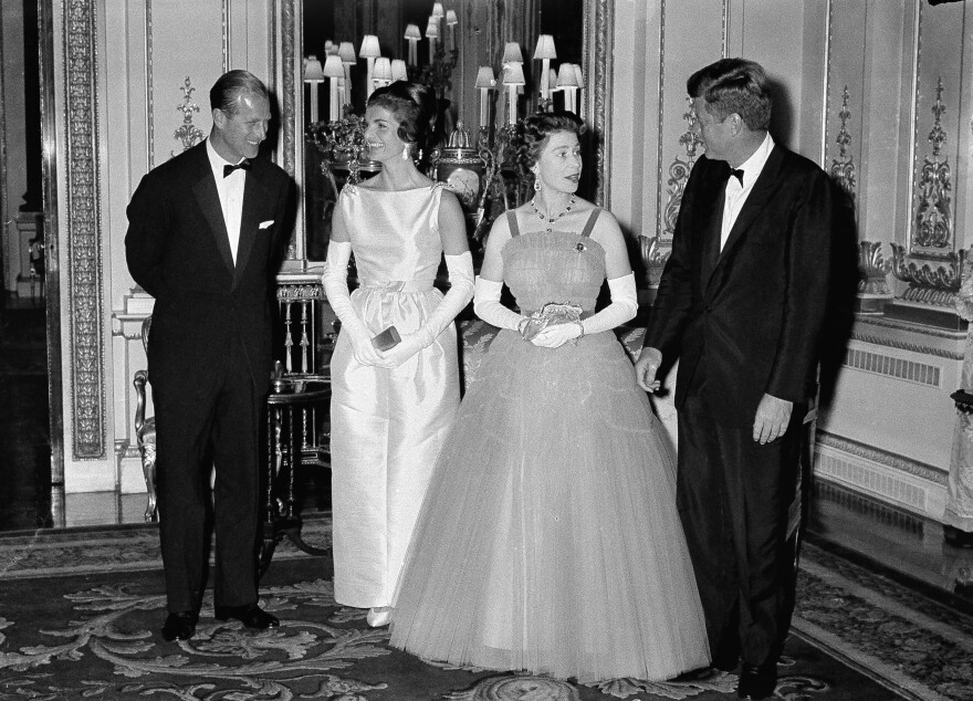 Prince Philip, first lady Jacqueline Kennedy and Queen Elizabeth II listen to President John Kennedy at Buckingham Palace in London on June 5, 1961.