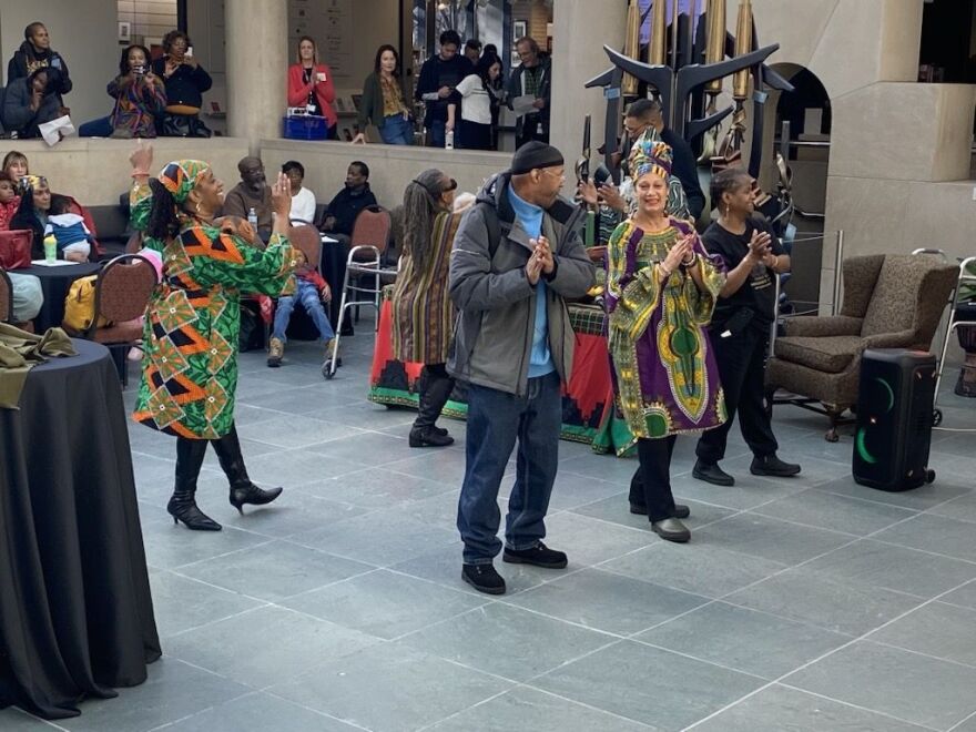 Participants taking part in the Kwanzaa Celebration of Ujima at the Memorial Art Gallery in Rochester on Saturday, Dec. 28, 2024.