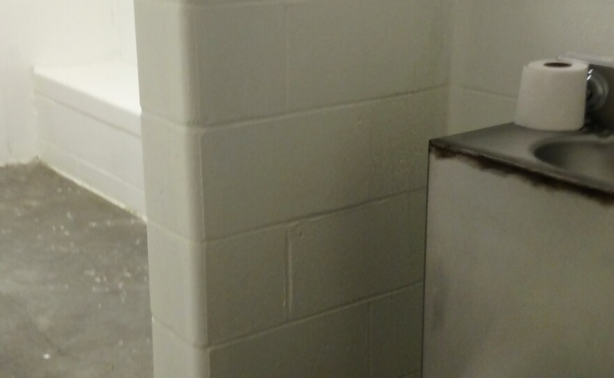 A cell in the Champaign County Jail that's sometimes used to house inmates who are suicidal. For the inmates' own safety, jail officials say, they may be placed alone in the cell with nothing but a mat and a garment that cannot be used to cause self-harm.
