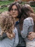 Jena Lopez with her daughters Sophie, left, and Nora. Research suggests that parental support is the key to good mental health in children who transition.