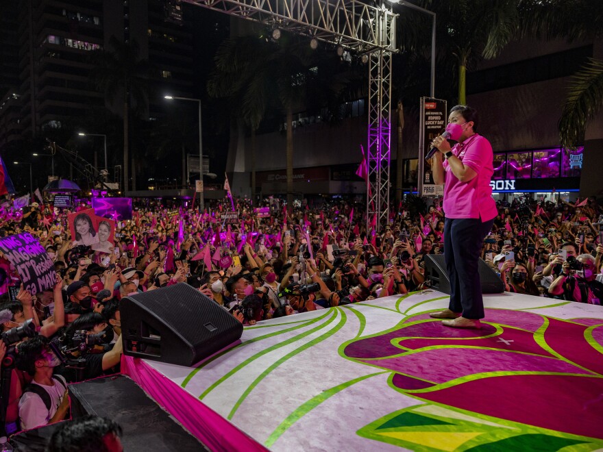 Vice President Leni Robredo takes part in a rally in March. Robredo is behind in polls but her numbers have risen dramatically in the most recent polling.