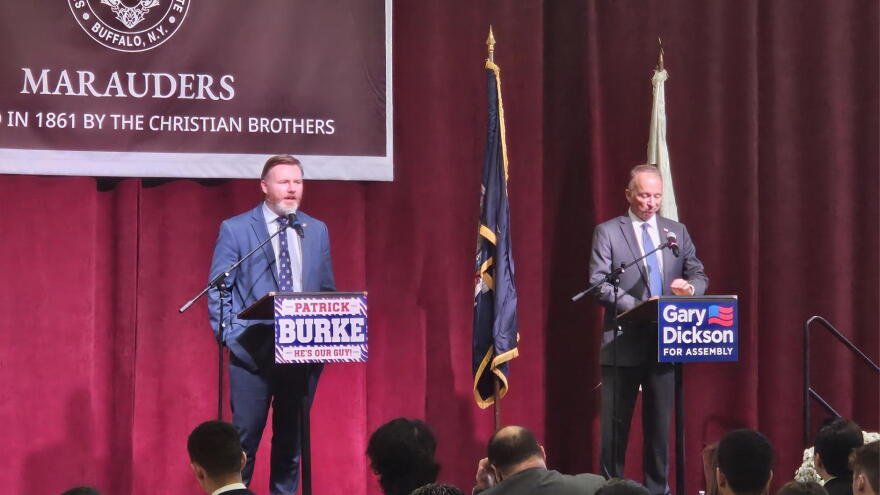 State Assemblymember Pat Burke, left, and challenger Gary Dickson debate at St. Joseph's Collegiate Institute.