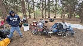 A day before the city cleared “The Pines” encampment on May 6, a resident showed off makeshift wagons used to carry belongings. With no central location to access resources, transportation has become an even greater challenge for Traverse City’s homeless residents.