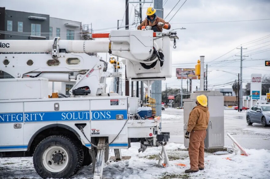  Electrical workers repaired a power line in Austin after a severe winter storm rolled through the state. SB 3 would require all power generators, transmission lines, natural gas facilities and pipelines to make upgrades for extreme weather — a process known as weatherization. 