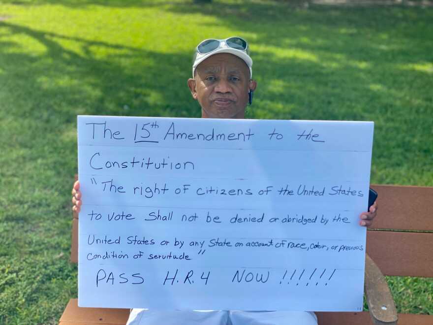 Charles Harris, 70, is a retired electrician and a Union Civil War reenactor. He joined the voting rights rally in West Palm Beach to make a statement about the 15th amendment.