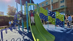 Students explore the playground they helped design at Whittier Elementary in South Scranton.