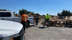 Volunteers helped clean up debris from a collapsed house in the Outer Banks.