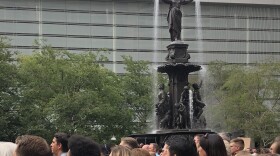Hundreds gathered Friday afternoon at Fountain Square for a moment of silence for the victims of Thursday's deadly shooting at Fifth Third Center.