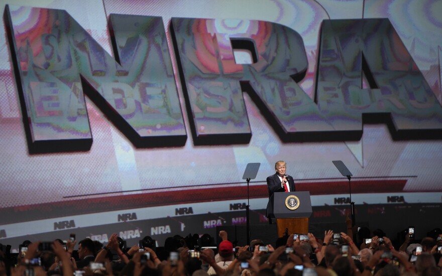 President Trump speaks during the National Rifle Association-ILA Leadership Forum on Friday in Atlanta.