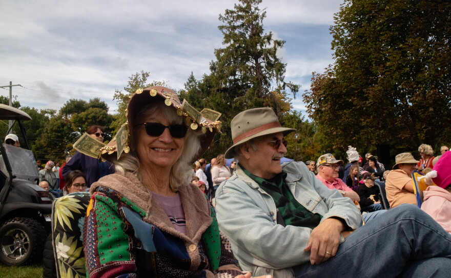 Gail McKenzie, left and Mikey McKenzie, right, wait patiently for the formal mystery safe extravaganza to begin.
