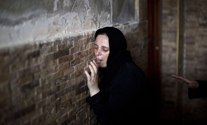 The Palestinian sister of Mohammed al-Daeri, 25, mourns during his funeral in Gaza City on Thursday.