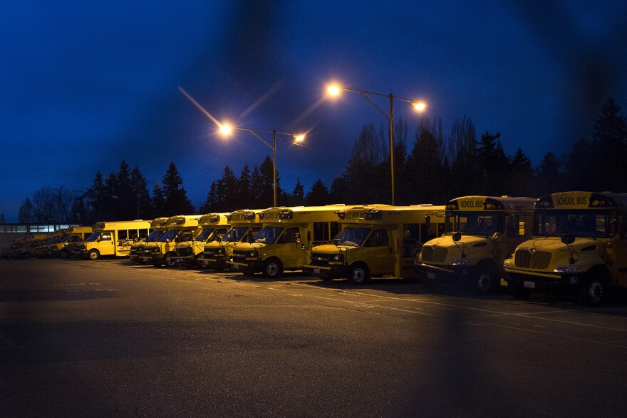 Buses are lined up inside the First Student bus lot on Lake City Way Northeast on Thursday, Feb. 1, 2018, in Seattle. 