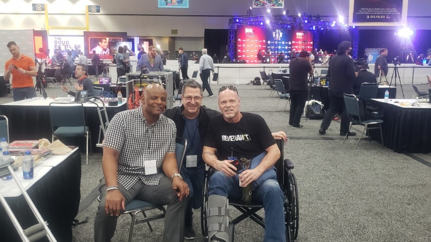 John Costacos (middle) with two of his favorite quarterbacks Warren Moon and Jim McMahon