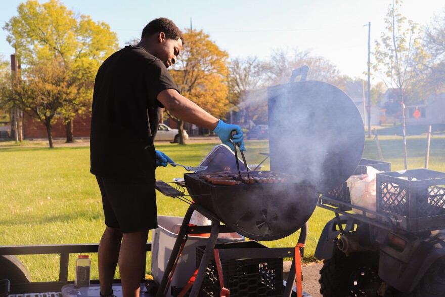 Garrett Ford cooking on the grill.