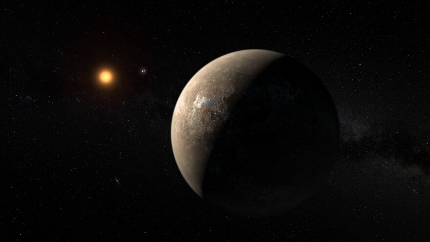 An artist's rendering shows what Proxima b and its star, Proxima Centauri, might look like.