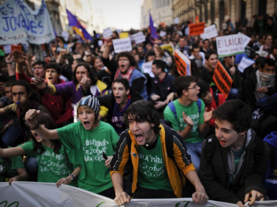 The clashes in Valencia triggered protests across Spain. Here, students protest in Madrid on Wednesday.