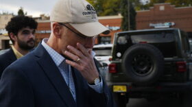 Brent Taylor answers reporter questions while walking into a GOP campaign rally on Tuesday, Oct. 27, 2026.
