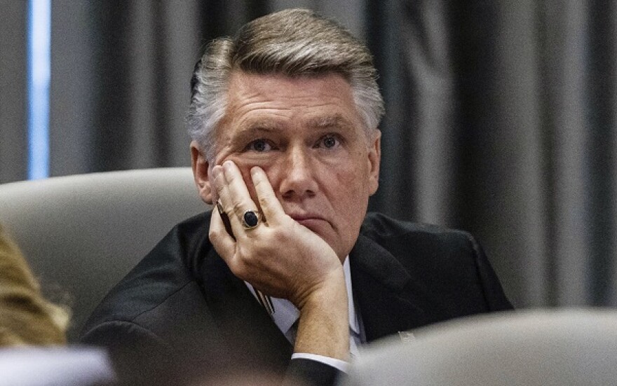 Mark Harris listens during a public evidentiary hearing on the 9th Congressional District investigation at the North Carolina State Bar in Raleigh, N.C., Monday, Feb. 18, 2019. (Juli Leonard/via AP, Pool)