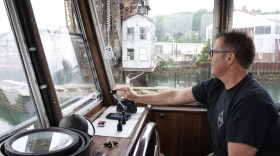 Captain Dave Stauffer of Island Tug and Barge steers a cleaner tugboat these days. No longer is the Duwamish river tracked with exhaust from tugboats leaving behind diesel. Still, problems remain with the health of the people who live nearby.