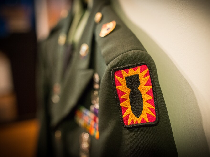 A close-up of the Explosive Ordnance Division patch on Michael Yandell's Army uniform.