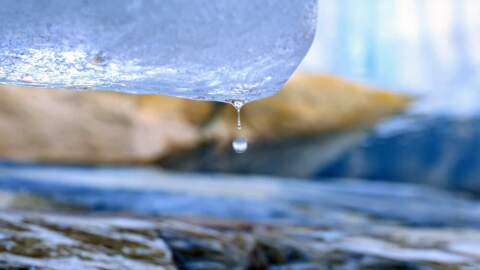 Water drips from a section of the melting Grinnell Glacier in Glacier National Park, Montana, on Oct. 19, 2023. (Josh Edelson/AFP via Getty Images)