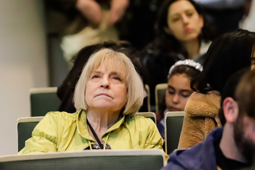 Judy Eledge attends an assembly meeting