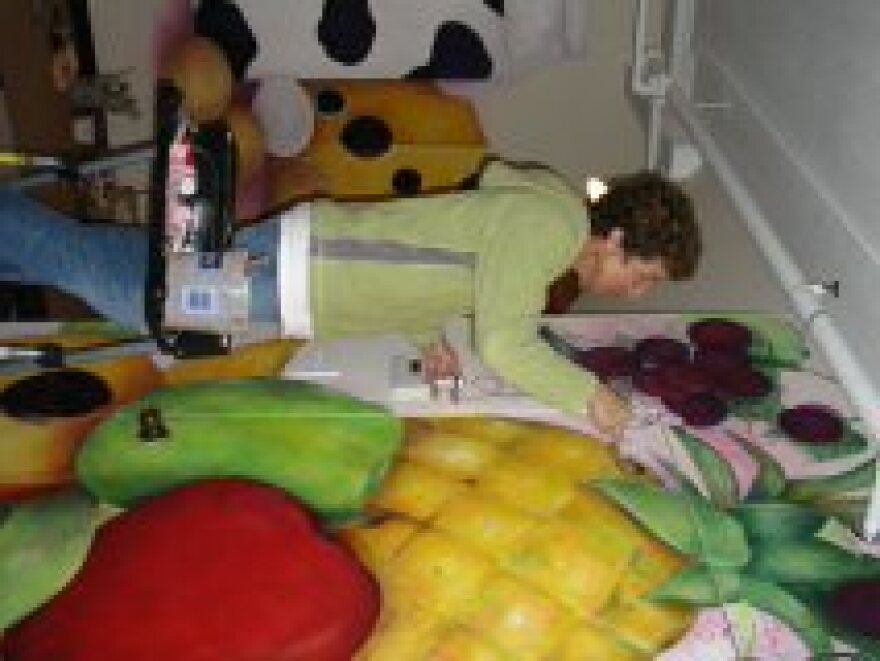 Artist Becky Cary at work in the museum