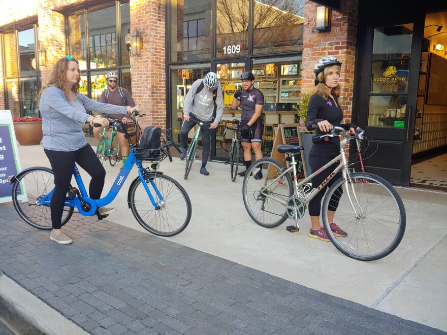 Riders begin their bike to work from Buddy Brew Coffee in Hyde Park.