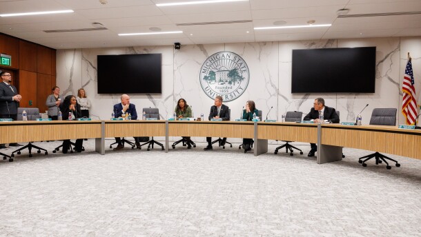 Michigan State University Trustees Rema Vassar, Mike Balow and Brianna Scott, President Kevin Guskiewicz and Trustees Kelly Tebay and Dennis Denno at a meeting of the Board of Trustees in East Lansing, Mich., on Feb. 7, 2025.