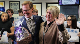 Alan Mather, president of the Golden Apple Foundation, presented the award to Codron Monday.