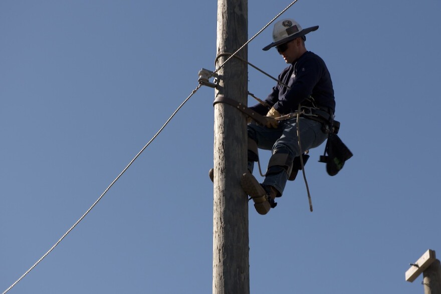 One of the events involves climbing up and down a pole as quickly as possible while trying not to crack an egg that Jesse Orr needs to carry in his mouth.