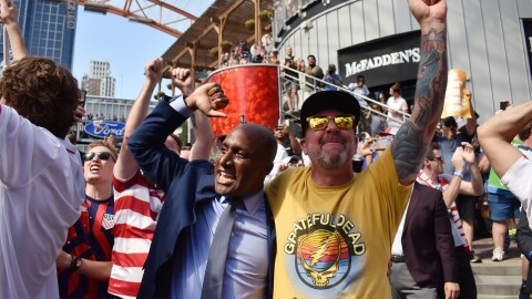 Mayor Quinton Lucas cheers alongside fans June 16, 2022, at Power & Light as news breaks that Kansas City will host during the 2026 World Cup.