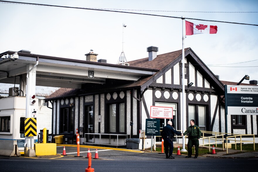 Richard Ross (right), agent in charge of the U.S. Border Patrol's Newport Station, greets a Canadian border agent at the Beebe, Quebec, and Beebe Plain, Vt., crossing.