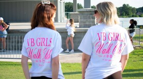 Melanie Bulaski, left, chats with Ashley O’Brien, right, before a VB Girls Walk Club event starts at the Mount Trashmore pavilion on June 24.