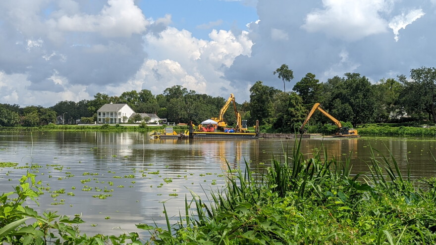 Contractors test the hydraulic and mechanical dredging methods that will be used to restore Baton Rouge's University Lakes system. August 4, 2022.