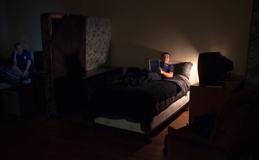 Veteran Kamil Mizinski rests up between calls. Shifts run from 7:30 a.m. to 7:30 a.m. the next day. Fire chief Frank Montagne says he's looking to hire 10 to 20 more by the end of the year and into 2014. He says the vets are disciplined and skilled and their military background makes them well suited to the job.