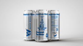 An illustration of the iconic Tyler Davidson Fountain from local artist Evan Verrilli is on the first edition of GCWW's canned tap water.