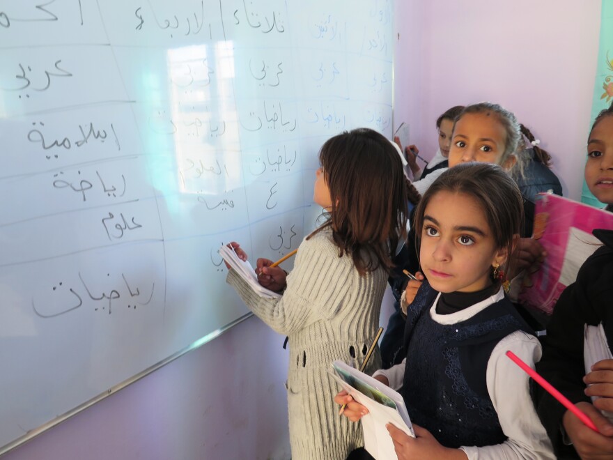 Residents repaired this Jalawla school after it was heavily damaged in fighting and both the Iraqi and Kurdish governments said they couldn't help rebuild the town. There is no heat but students are back in class.