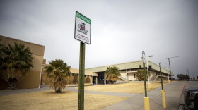 The parking spot for Greg Heiar, former New Mexico State University men's basketball coach, shows a reserved sign outside the Pan American Center, Wednesday, Feb. 15, 2023, in Las Cruces, N.M.