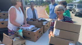 Left to right: Chris Lavenets, Rachel Todoroff, Deke Knight, Carol Flynn (partially obscured), and Kathy Kurniawan delivering in Hyannis.