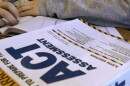 FILE - This April 1, 2014 file photo shows an ACT Assessment test in Springfield, Ill. The popular ACT college admissions exam is broadening how it reports student's scores. The exam's traditional 36-point scale remains unchanged, but starting next year students will receive an ACT score on two new "readiness indicators" reflecting how they did in terms of career readiness and understanding a complex text.