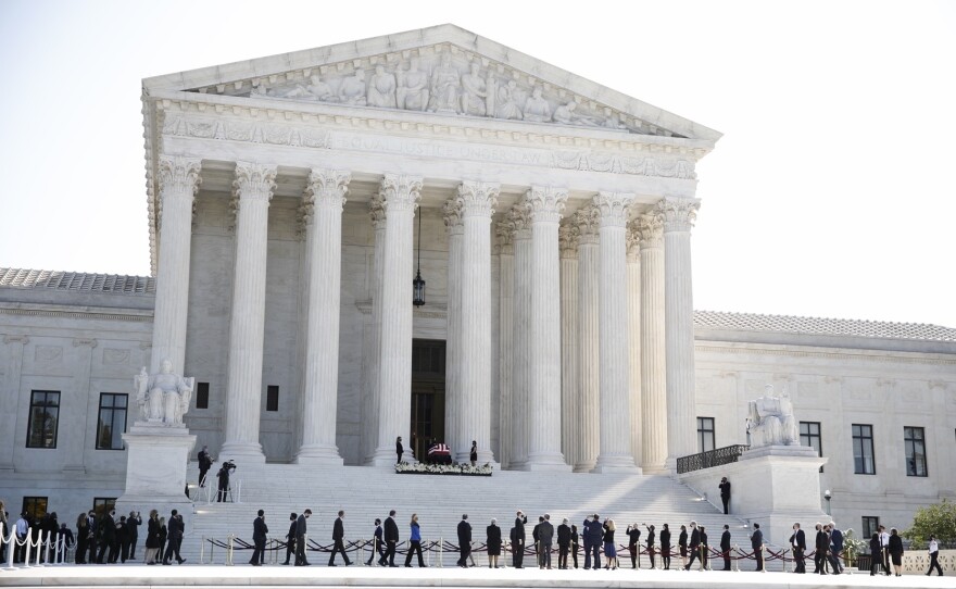 Supreme Court staff pay their respects for Associate Justice Ruth Bader Ginsburg.