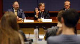 Supreme Court Associate Justice Sam Ervin IV, center, answers a question at the North Carolina Supreme Court Candidate Forum at Duke University Law School in Durham, N.C., Wednesday, Oct. 26, 2022.