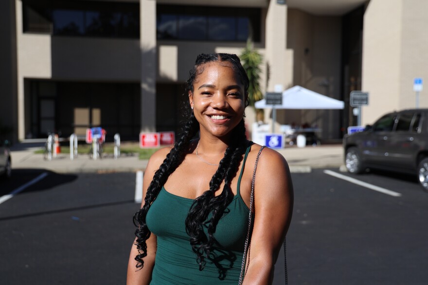 Morgann Robinson, 31, of New Smyrna Beach, Fla. poses for a portrait after voting at the Alachua County Supervisor of Elections office on the penultimate day of early voting. (Diego Perdomo/Fresh Take Florida)