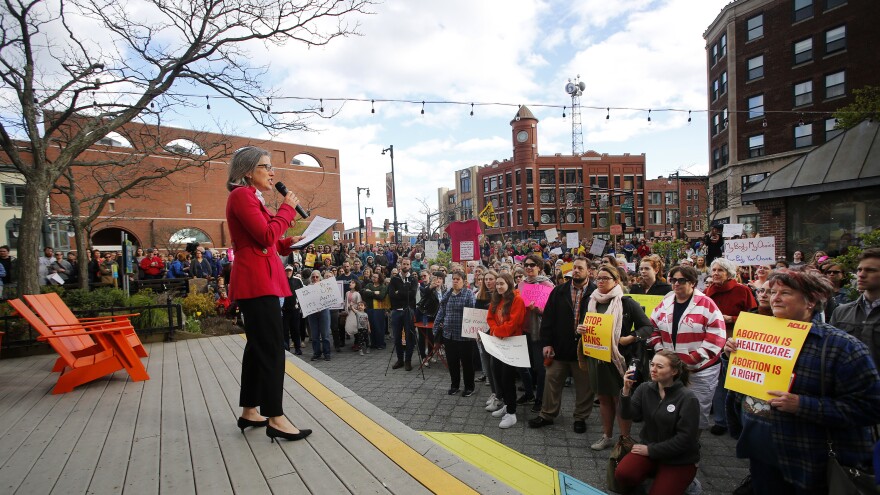Alison Beyea of ACLU of Maine speaks during an abortion-rights rally at Congress Square Park in Portland, Maine, in May. Democrats elected last November have pushed through two laws that expand access to abortion in the state.