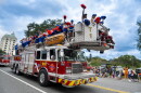 UF Cheerleaders ride on a Gainesville Fire Rescue truck during the University of Florida Homecoming parade Oct. 9, 2026, in Gainesville, Fla. (Andy Acosta/WUFT News)