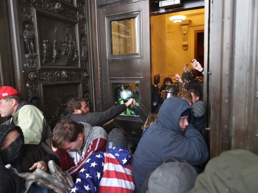 After a series of phone calls from local and Capitol Police leaders to Defense Department officials, the D.C. National Guard is deployed to help end the riot that saw Trump supporters breaking windows to get into the Capitol.