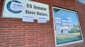 While a mob stormed the Capitol on January 6, someone protested Republican Montana Sen. Steve Daines's role in inciting the insurrection by taping signs to his Missoula office with the words "sedition" and "authoritarian." 